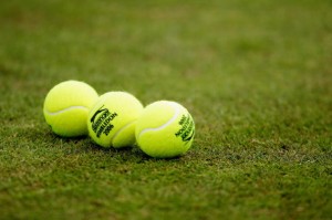 LONDON - JUNE 29:  Tennis balls are shown on the grass during day four of the Wimbledon Lawn Tennis Championships at the All England Lawn Tennis and Croquet Club on June 29, 2006 in London, England.  (Photo by Ian Walton/Getty Images)